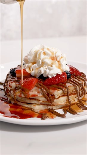 Cheers to extra syrup🥞 Haven’t tried our NEW Chocolate Hazelnut & Berry Pancakes? It’s not too late! Order now: https://cornerbakerycafe.com/start-your-order | Corner Bakery