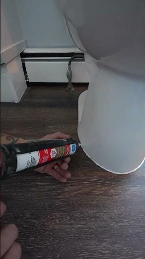 installing silicone sealant around the toilet #homeimprovement #constructionchannel