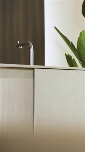 The kitchen as an architectural experience. Vertical is a project that gives shape to a quiet, profound aesthetic, expressing the Modulnova identity through the balance of material, design and light. | MODULNOVA