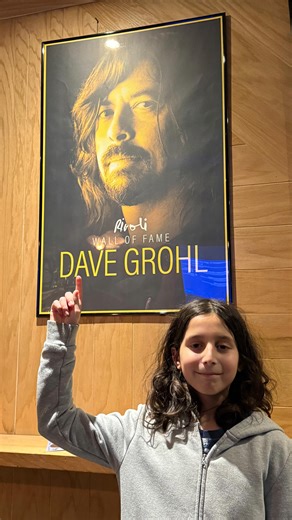 Rivoli on Instagram: "Eleven-year-old drummer nails ‘Everlong’! 🥁🤘 Rock n roll is in good hands with Kai the Drummer! Kai is seen posing in the cover image with a photo of rock legend and Rivoli alumnus, Dave Grohl. As the drummer in Nirvana, Grohl would undoubtably applaud this young man’s talent. The Foo Fighters’ frontman provided both lead vocals and lead guitar for the hit song covered here. Kai was once again on stage as part of the Sundown Sessions. This monthly series for emerging arti