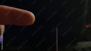 Pointing finger connecting to lightning sparks from high voltage tesla generator