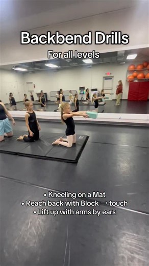 An easy backbend drill for ALL levels! Use a block to guide your range and build strength control. •Warm up your back safely before walkovers and back handsprings. • Don’t force the bend — lift through your chest and reach long! • Try this before every flexibility session • Save this for later follow for more drills! #danceteacherlife #dancestudiolife #tumbling | Kickin' It Dance Company