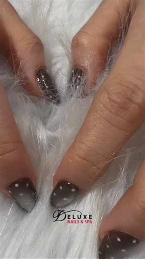 Minimal, moody, and modern 🤍 Neutral nails with a glossy finish that goes with everything. Less is more 🤎 #NeutralNails #ClassyNails #GlossyNails #NailInspo #SudburyNails | Deluxe Nails & Spa