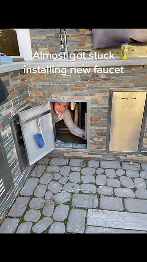 Almost got stuck installing new faucet #muffinspub #fyp #garagebar #patio #patioseason #outdoorkitchen #diy#callfirefighters #sink