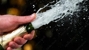 Super slow motion of Champagne explosion, opening champagne bottle closeup. Filmed on high speed cinema camera, 1000fps