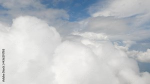 dive in to a fluffy smooth cotton white clouds, Flying through amazingly beautiful heavenly clouds sky. fly on the high sky good atmosphere. dreamy clouds in heaven. sky and clouds from plain window.