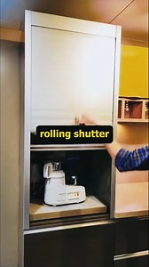 Pull. Slide. Cook. Repeat. 🔥 Smart kitchen storage with pull-out tray & rolling shutter = next-level convenience! #ModularKitchen #SmartStorage #KitchenDesign | Aluminium Glass Design