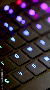 cool gaming keyboard with colorful lights. Made for gamers. It's for playing games on computers. Shopping online for electronic stuff.