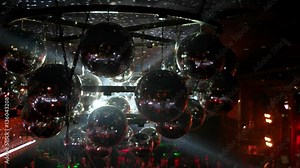 Disco ball reflecting light from the spotlights on prom disco, Disco in the nightclub, the spotlight is reflected in the mirror ball