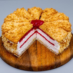 My host in France taught me how to cook this fantastic cake! Ready in 20 min! Ingredients: puff pastry - 300 g (10.6 oz) water - 20 g (0.7 oz) sugar - 30 g (1 oz) cinnamon - 5 g (0.18 oz) vanilla sugar - 20 g (0.7 oz) sugar - 100 g (3.5 oz) flour - 50 g (1.76 oz) melted butter - 100 g (3.5 oz) Tray size 34 X 45 cm (13.5 x 17.3 in) IN THE OVEN 180°C (356 °F)/20 minutes frozen raspberry - 250 g (8.8 oz) sugar - 50 g (1.76 oz) lemon juice - 30 ml (1 fl oz) starch - 15 g (½ oz) For the cream: whippi