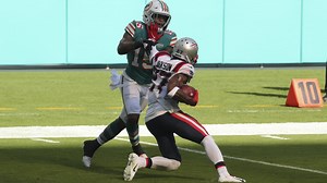 J.C. Jackson steps in front of Tagovailoa's errant throw for goal-line INT