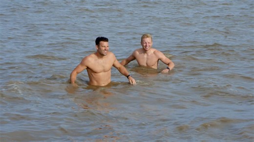 Mark Wright wows fans as he strips down to his boxers to take a dip in the sea