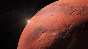 Rotating Mars Planet with Sun in Space