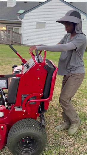 Safety first when cutting by lakes. Use string trimmer or walk behind to cut the lowest part.