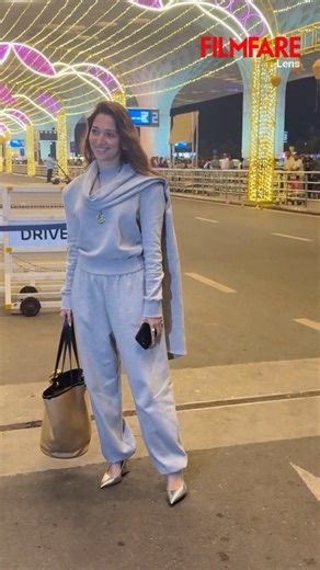 #TamannaahBhatia redefines travel chic in this perfectly co-ordinated grey tracksuit as she makes her way through the airport. ❤️ #FilmfareLens | Filmfare