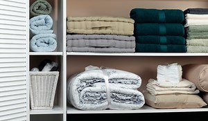 Tackle Your Next Weekend Project With These Easy Linen Closet Organization Ideas