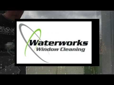 Removing paint spots from windows and window frames using Bronze Wool whilst window cleaning