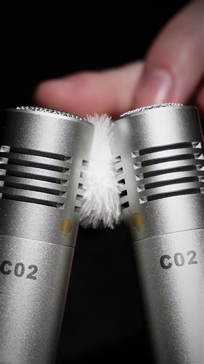 Fluffy ear pick between your ears #asmr #fluffy #earpick #tingles