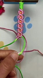 Instructions for tying a pretty pink bracelet #crafts #diy #bracelet | Craft 1 Minute