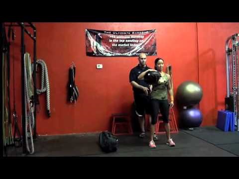 Ultimate Sandbag Training Shoulder Squat Exercise