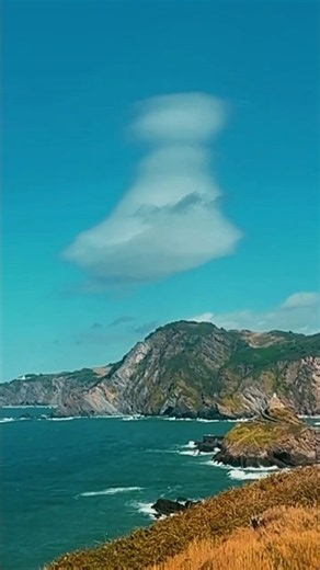A Strange Funnel Cloud Hovers Over the Golden Cliffs of Devon’s Coast