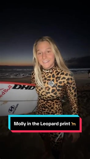 Molly Picklum in Leopard Print Wetsuit Surfing
