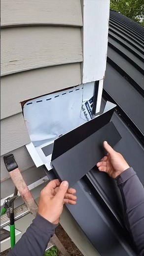 Metal roof ridge cap installation