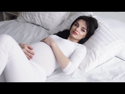 Pregnant Beautiful Woman Lying On Bed And Caressing Baby Belly | Stock Footage - Videohive