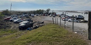 2 dead after helicopter crash in Louisiana marshland, officials say