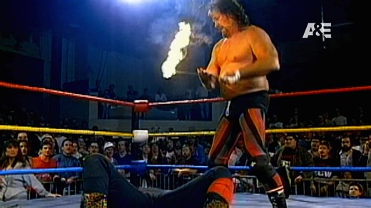 Who remembers this Mick Foley moment? Tune in tonight for back-to-back episodes of WWE's Greatest Moments: Tag Teams & Mic Drops starting at 9/8c only on A&E. | WWE