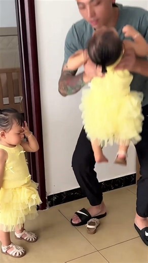 The twins deal with their dad by crying and making a fuss