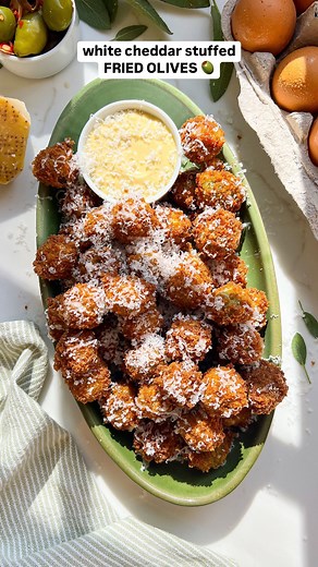 Lauren Sephton | Bright Moment Co. | EP. 3 | GAME DAY BITES 🏈 salty olives stuffed with aged white cheddar cheese, battered in a simple parmesan breadcrumb mix, and fried until... | Instagram