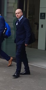 Police officer guilty of grabbing teenage fare dodger by the neck in train station assault