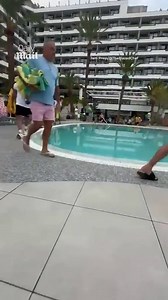 Hotel worker almost trampled by 'stampede' of guests rushing to bag sun beds