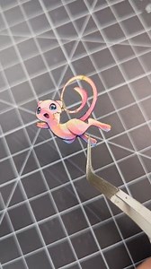 3D Mew made from Pokémon Cards. I battled back and forth if I should add the star with him. I decided not to but I'm sure someone will tell me I should have added it 😂 I know everyone wants Totodile but if you have another suggestion lemme know! #3dcards #pokemon151 #pokemontcg #pokemoncards #pokemoncommunity | 3Devious_Art