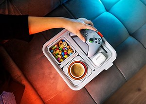 Couch Console charges and organizes your couch goodies
