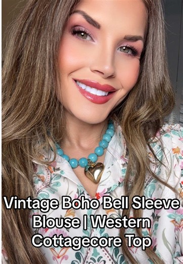This vintage-inspired boho blouse is the definition of effortless style. Featuring dramatic bell sleeves, a soft floral print, and a flattering relaxed fit, this top gives western, cottagecore, and romantic bohemian vibes all in one. Perfect with denim, boots, or layered jewelry for an elevated everyday look. @Sage Vell #tiktokshopcreatorpicks #creatorpicksambassador #fashionover40 #styleinspo #boutiquestyle