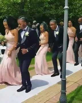 Bridal party turnt up going down the aisle