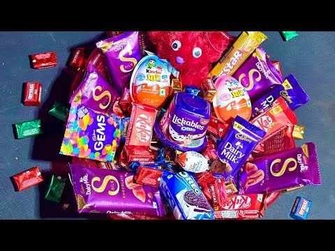 surprise toys opening,lots of chocolate New kinder surprise chocolate egg,