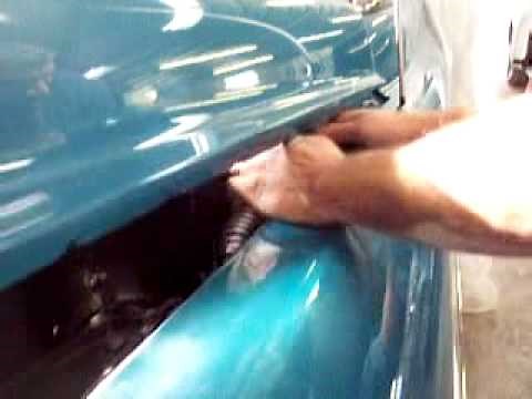 removing a hood hinge spring