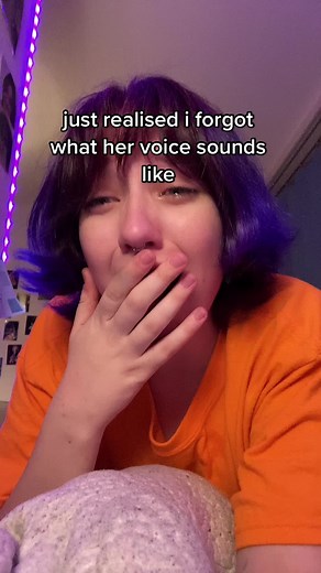 Contemplative Moments with Purple Hair and LED Lights