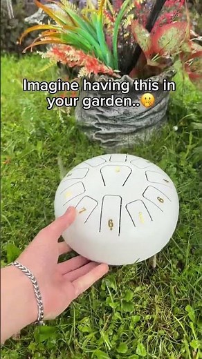 Bringing a little harmony to the backyard✨😌#garden #instrument #rain #home #drum #nature #relaxing