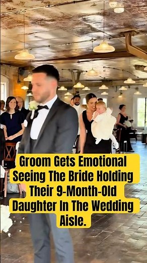 Groom Gets Emotional Seeing The Bride Holding Their 9-Month-Old Daughter In The Wedding Aisle.