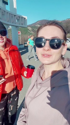 Outdoor Scene with Stylish Red Jacket and Grey Hoodie
