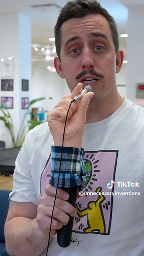 i made a microphone thats a hand holding a microphone. #unnecessaryinventions