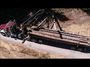 Peterbilt 357 Self Loader Loading Douglas Fir on a Thinning Job