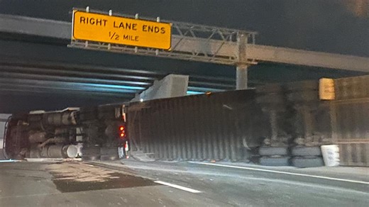 Northbound I-65 closed at the North Split due to semi rollover