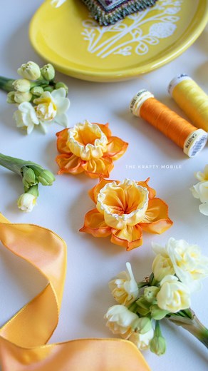 Let’s make a ribbon daffodil Fellow Crafters! I love this time of year, when daffodils start to appear in my garden, so I thought I’d have a go at making one from ribbon. Here’s how: 💛 I’ve used a 2.5cm (1 inch) wide ombre ribbon. Mine has wired edges, but they can still be made without the wire - the shape will be a little softer. 💛The daffodil is made up of two parts - the base and the cup. For the base, you will need to cut a piece of ribbon 12.5 times the width of the ribbon (in my case, 1