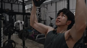 Pec Deck Fly Machine, Muscular Man Sculpting Arm Strength with Gym Exercise Machine ,Fitness Enthusiast Working Out, Powerful Arm Muscle Strengthening in Gym Workout Session, Fitness.