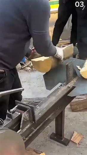 the process of splitting a tree trunk with a tool